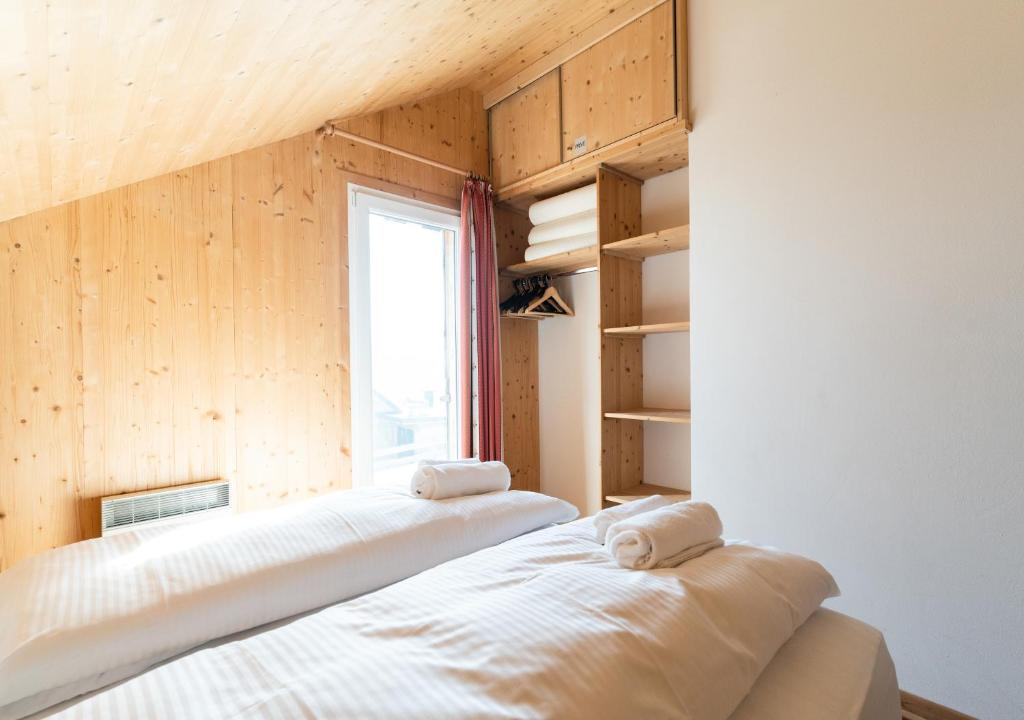 Postel nebo postele na pokoji v ubytování 1A Chalet Eck - Wandern, Grillen, Panorama Sauna!