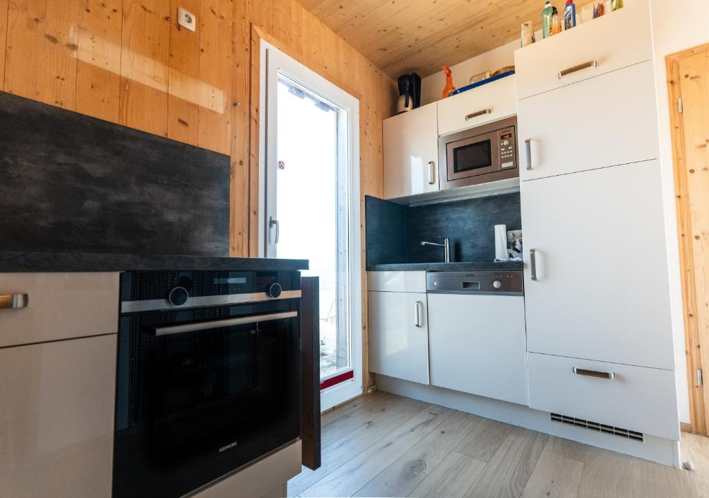 Kuchyň nebo kuchyňský kout v ubytování 1A Chalet Eck - Wandern, Grillen, Panorama Sauna!