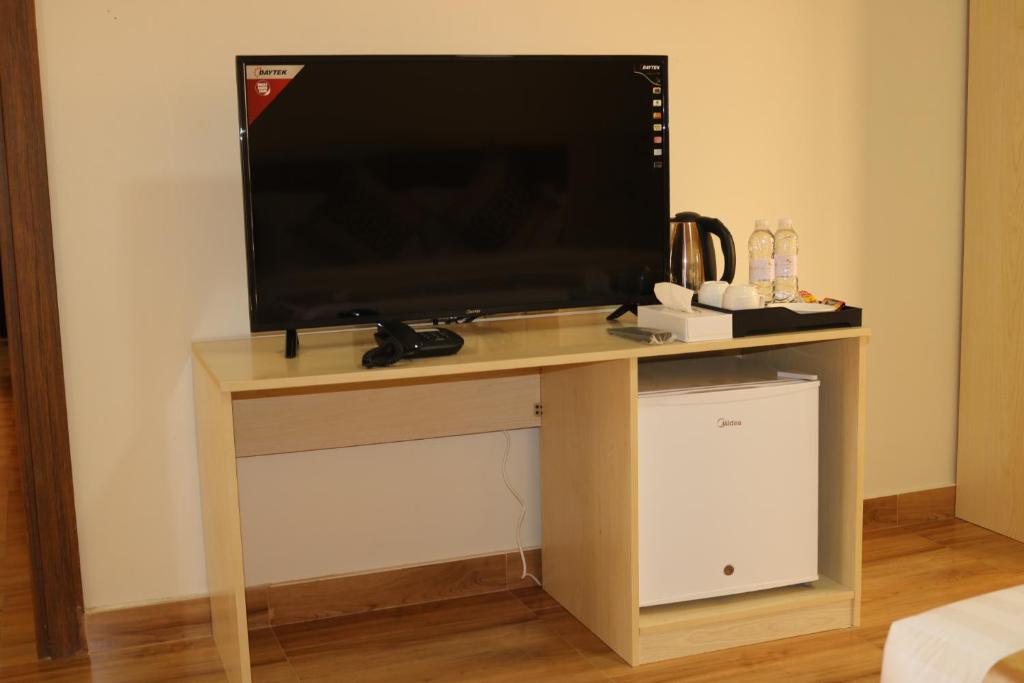 TV a/nebo společenská místnost v ubytování Lina Dreamland Resort