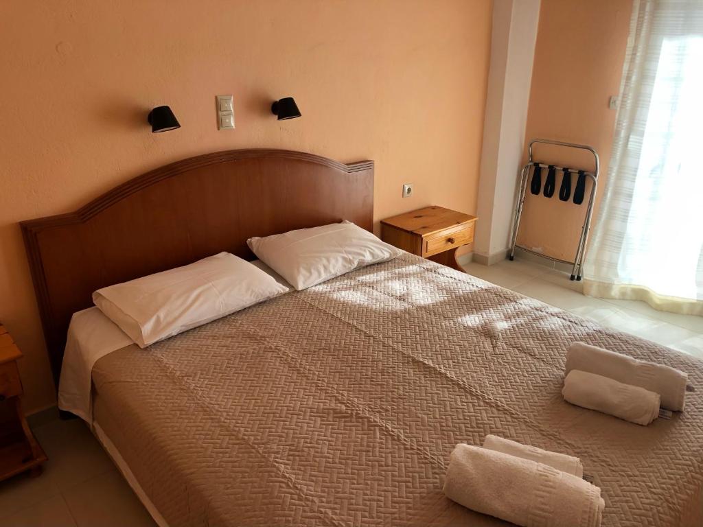 Postel nebo postele na pokoji v ubytování Babis Hotel