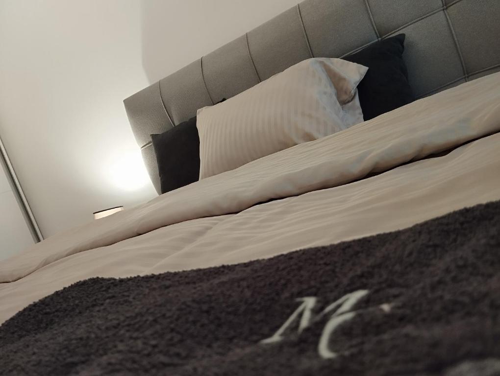 a close up of a bed in a room at Cevahir Sky City Happy Apartment in Skopje