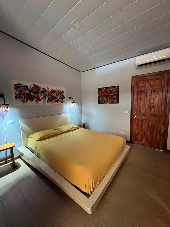 Postel nebo postele na pokoji v ubytování AmimodoBeachRooms
