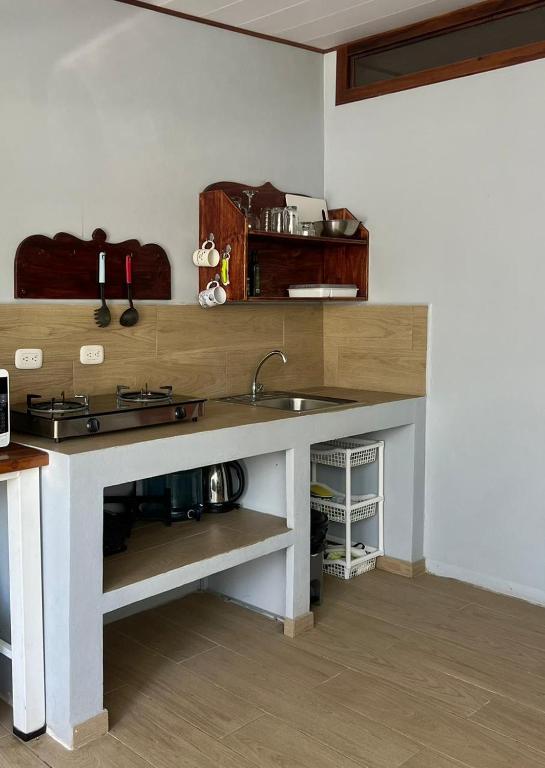 Kuchyň nebo kuchyňský kout v ubytování AmimodoBeachRooms