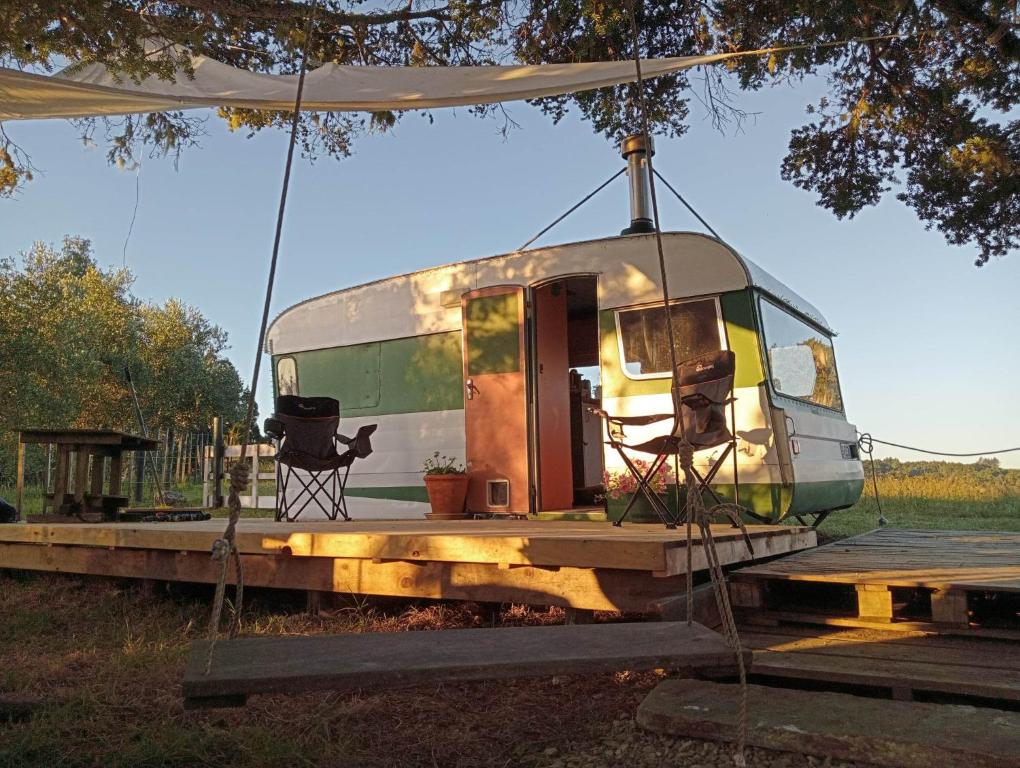 an old trailer sitting on top of a table at Down to earth NZ in Kerikeri