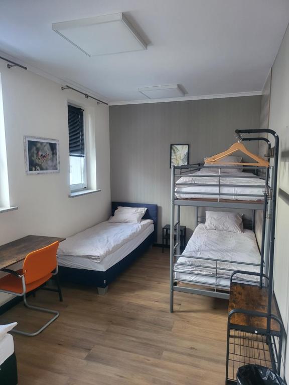Postel nebo postele na pokoji v ubytování Rooms4Rest Bokserska - Private rooms for tourists - ATR Consulting Sp, z o,o,