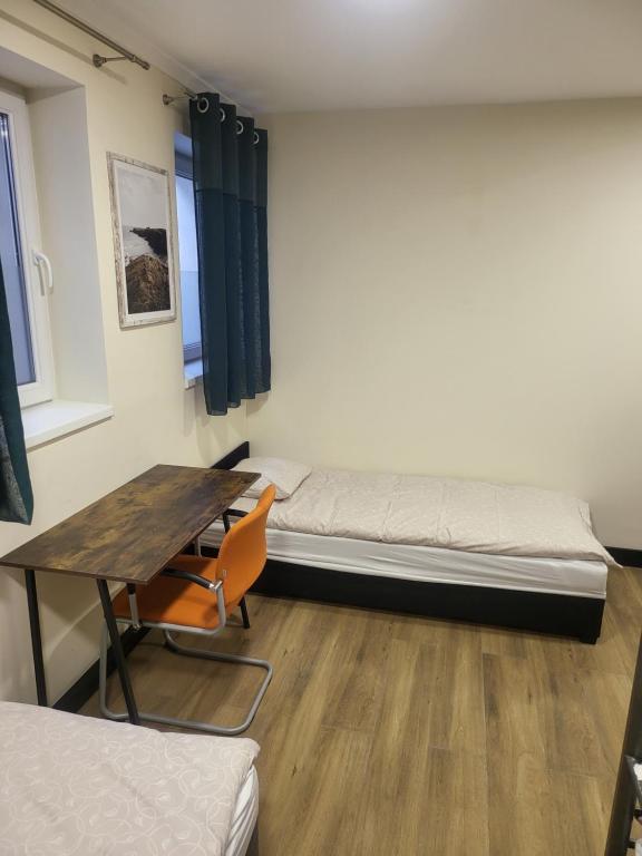 Postel nebo postele na pokoji v ubytování Rooms4Rest Bokserska - Private rooms for tourists - ATR Consulting Sp, z o,o,