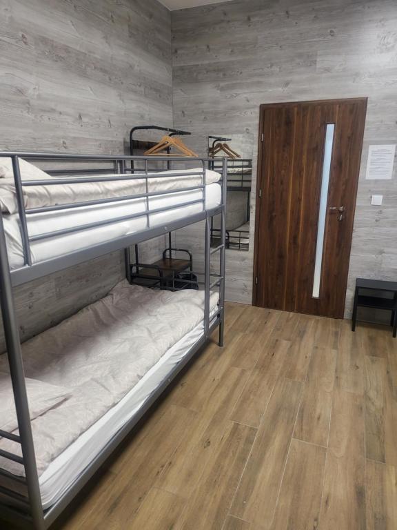 Postel nebo postele na pokoji v ubytování Rooms4Rest Bokserska - Private rooms for tourists - ATR Consulting Sp, z o,o,