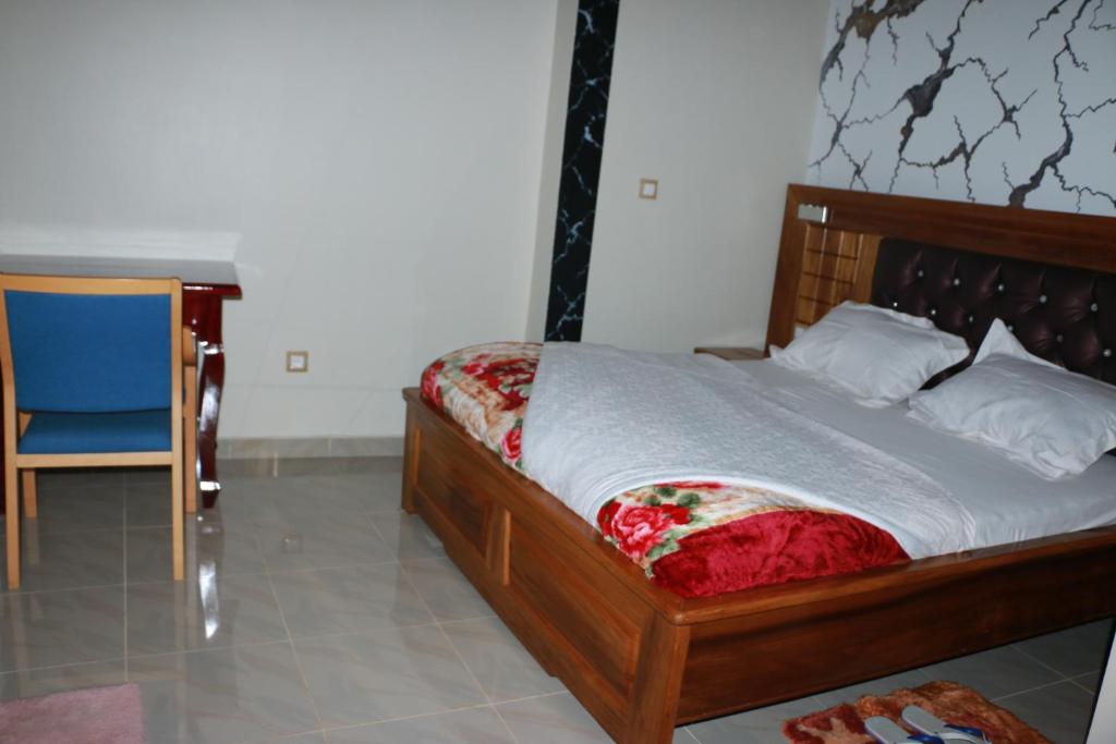 Postel nebo postele na pokoji v ubytování DEUDJUI HOTEL