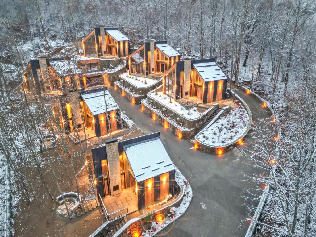 an aerial view of a building in the snow at Holiday Villas in Orllan