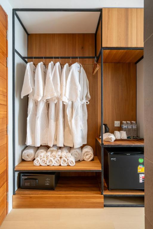 Kuchyň nebo kuchyňský kout v ubytování Woodstory Boutique Hotel