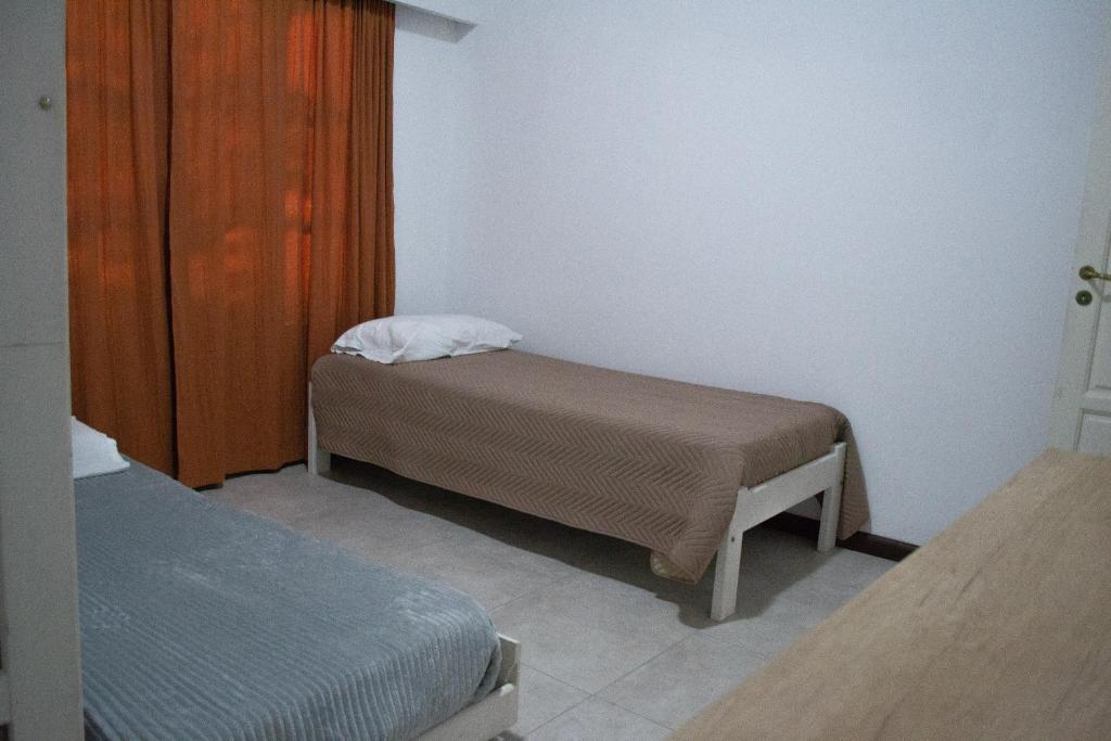 Postel nebo postele na pokoji v ubytování Amplio chalet en zona centro San José, Entre Ríos