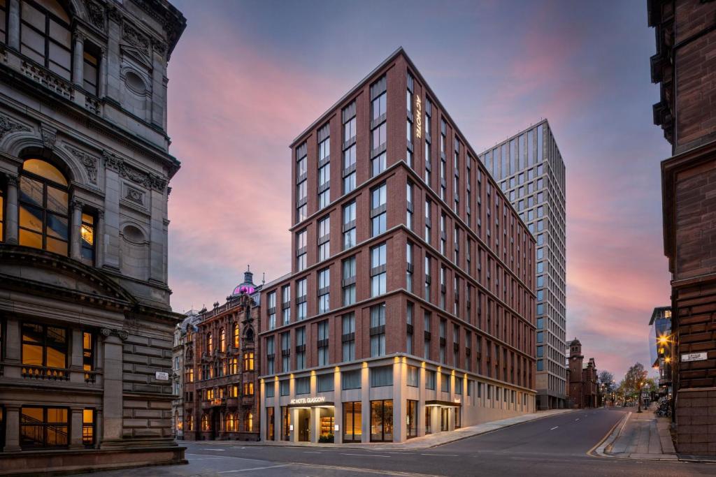 uma representação de um edifício alto numa cidade em AC Hotel by Marriott Glasgow em Glasgow
