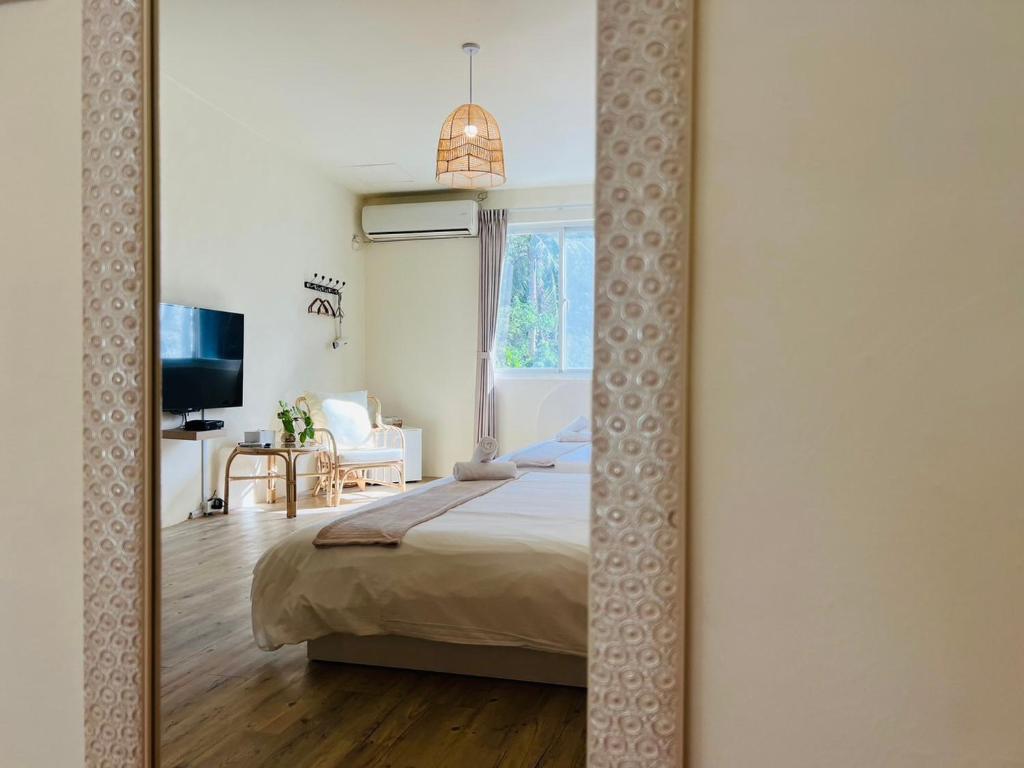 Postel nebo postele na pokoji v ubytování W24 Kenting Hostel II