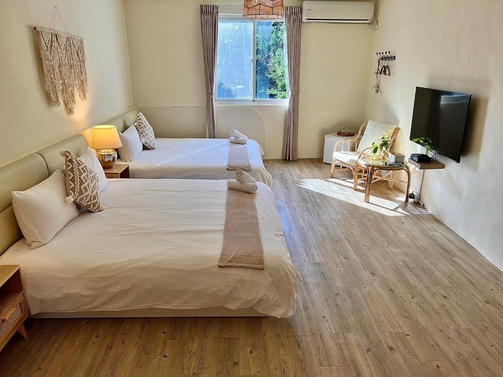 Postel nebo postele na pokoji v ubytování W24 Kenting Hostel II