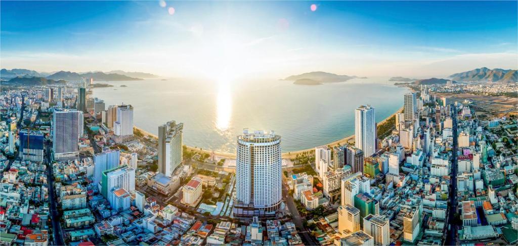 an aerial view of a large city with the ocean at Panorama Nha Trang Emm in Nha Trang