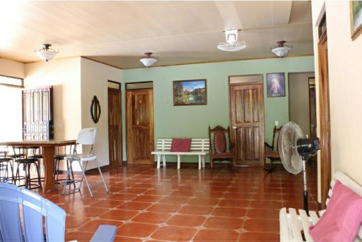 a large living room with a table and chairs at Quinta Alfa in Jesús María