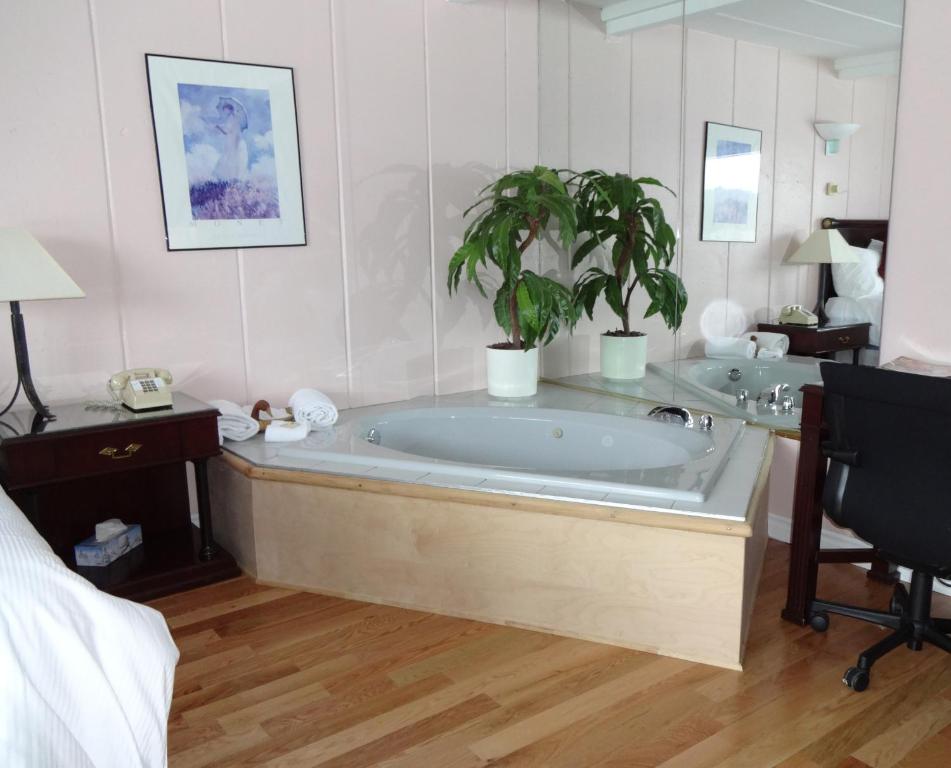 Postel nebo postele na pokoji v ubytování Motel Tremblant
