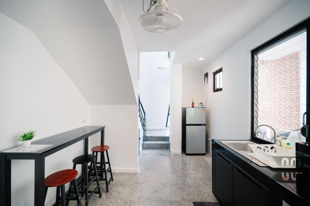 Kuchyň nebo kuchyňský kout v ubytování Mitt Haus (Lat Phrao Soi 5)