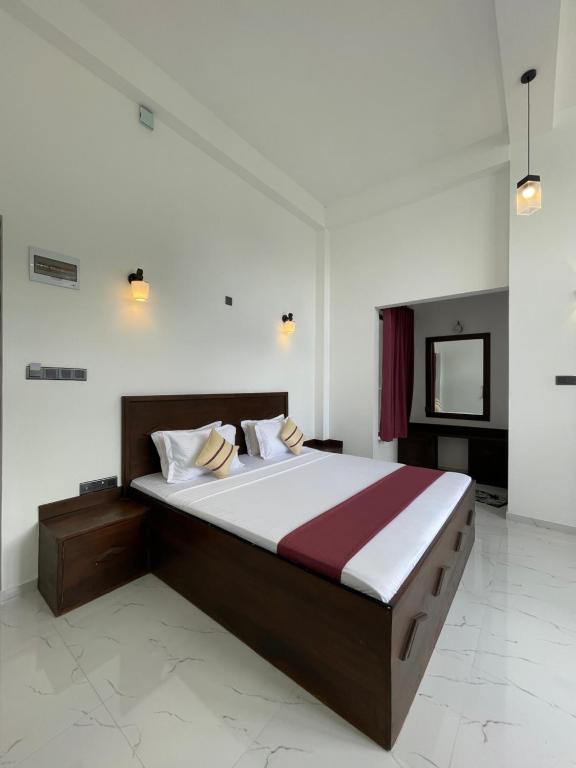 Postel nebo postele na pokoji v ubytování Hotel Kanvinra