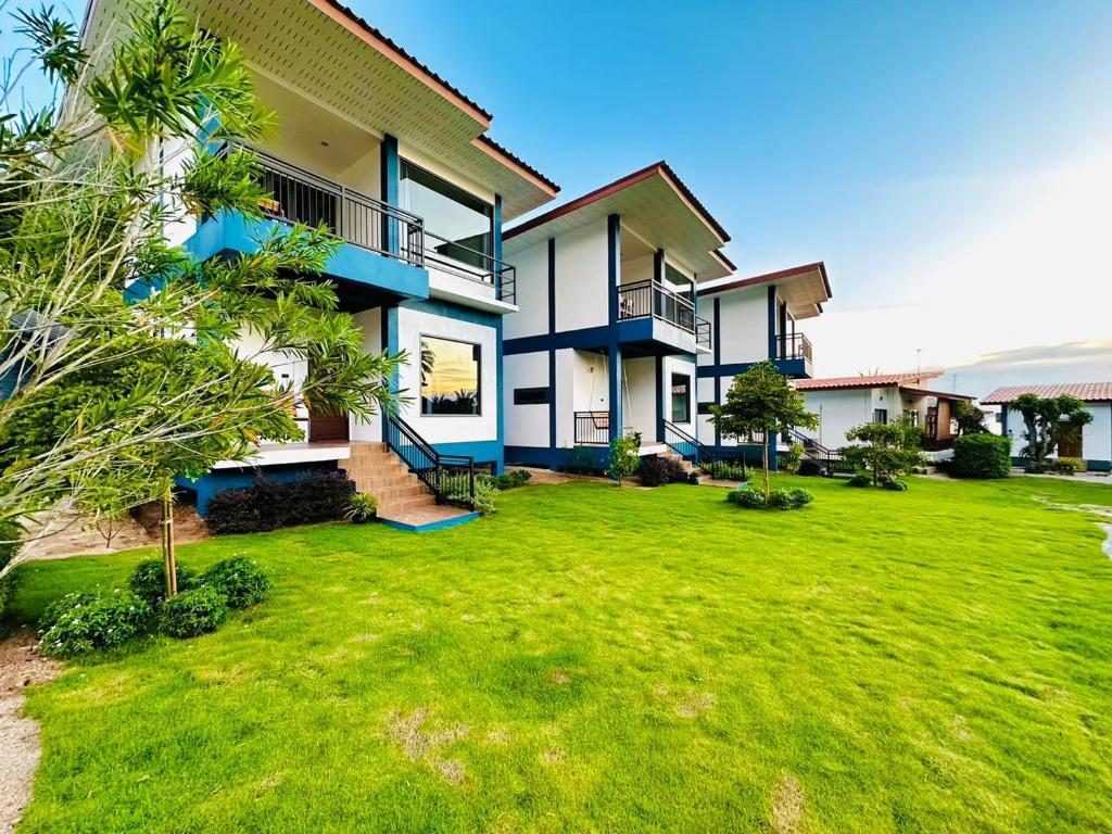 an image of a house with a yard at The Scenery Beach Resort in Baan Khai