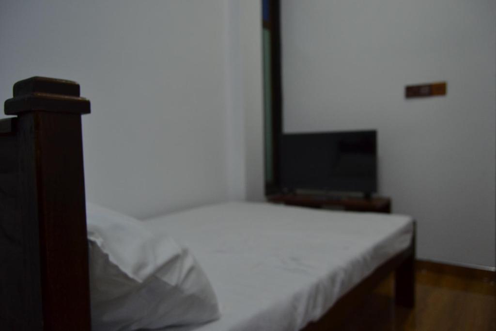 Postel nebo postele na pokoji v ubytování BW Residence