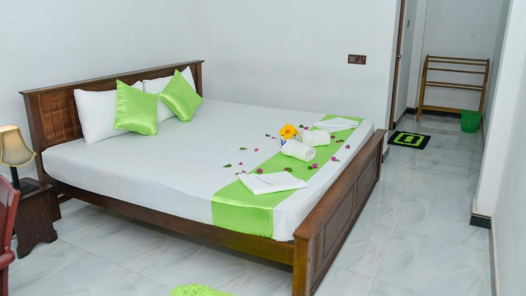 Postel nebo postele na pokoji v ubytování Prem Nadee Homestay