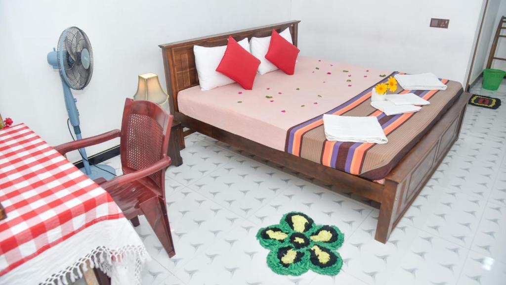 Postel nebo postele na pokoji v ubytování Prem Nadee Homestay