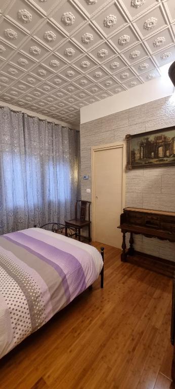 Postel nebo postele na pokoji v ubytování 3B Locazione Turistica