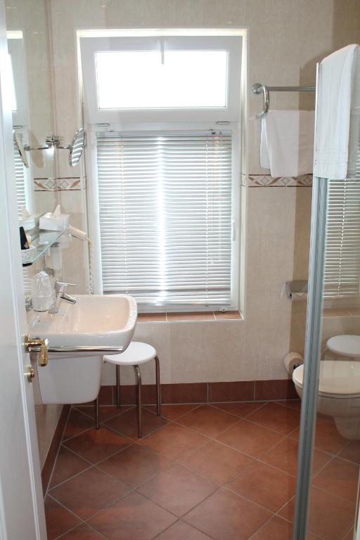Koupelna v ubytování Alexa Hotel