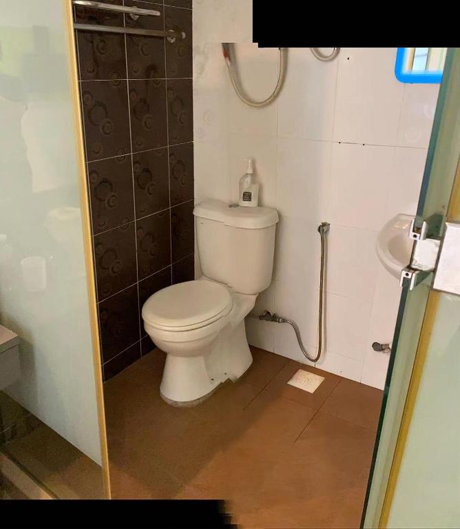 Koupelna v ubytování Best Hotel