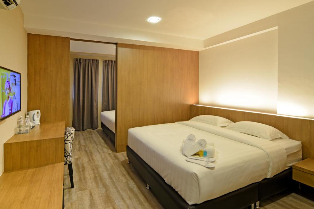 TV a/nebo společenská místnost v ubytování De Parkview Hotel