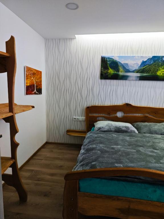 Postel nebo postele na pokoji v ubytování Chalety Bystra