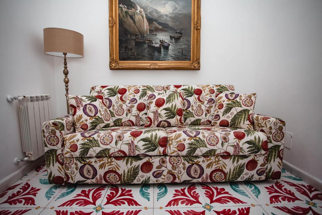 A bed or beds in a room at Delfini Trevi House