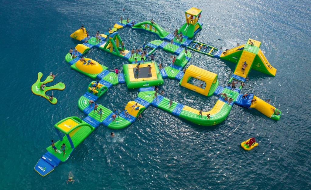 an aerial view of an inflatable water park at Appartement La Croisette in Nabeul