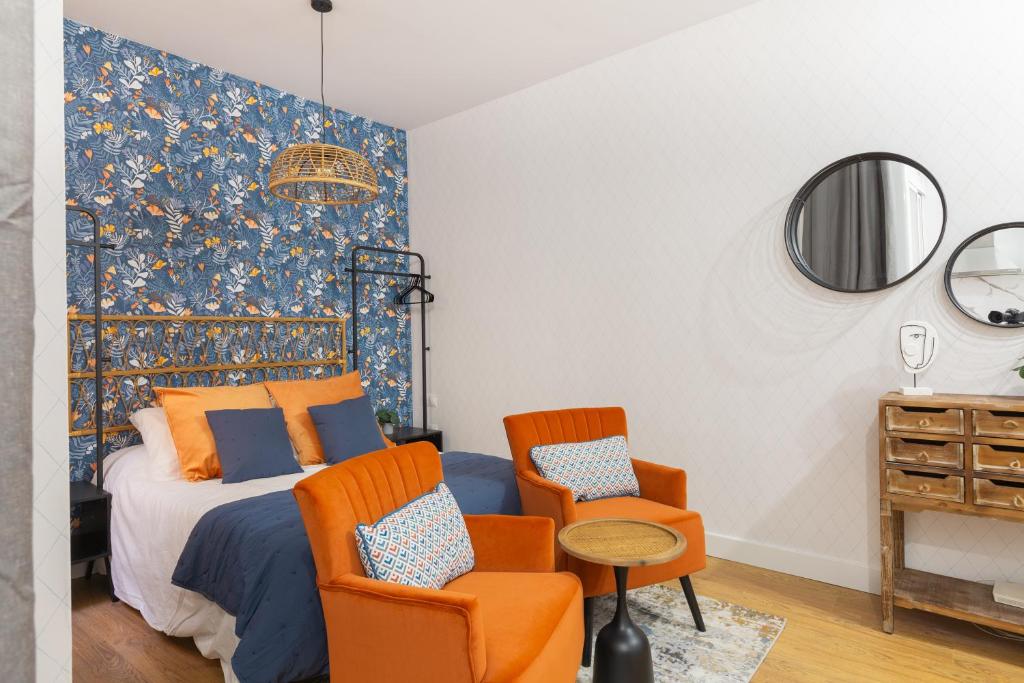 A bed or beds in a room at Casa Armonía