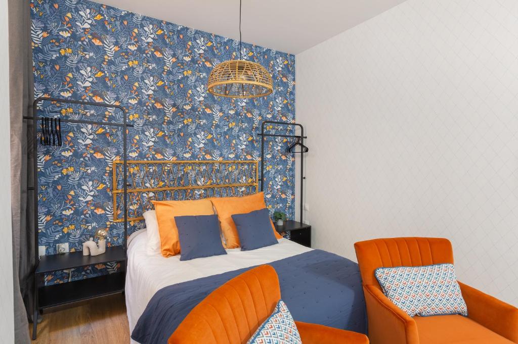 A bed or beds in a room at Casa Armonía