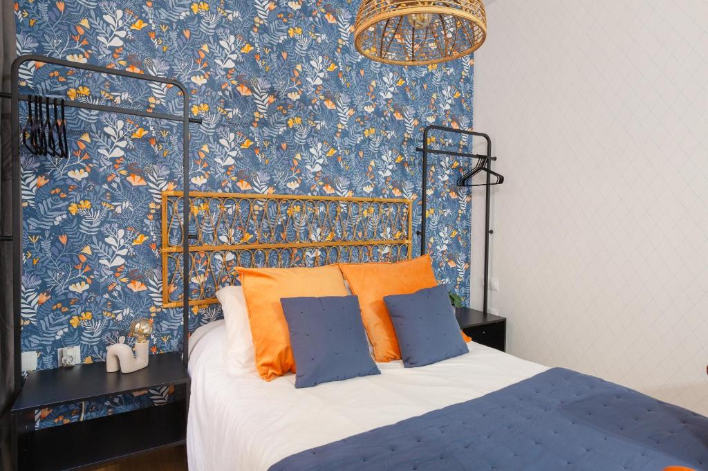 A bed or beds in a room at Casa Armonía