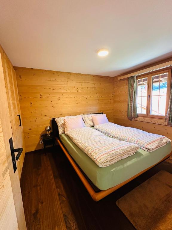 Postel nebo postele na pokoji v ubytování Chalet Solaria 2 bedrooms with mountain and garden view