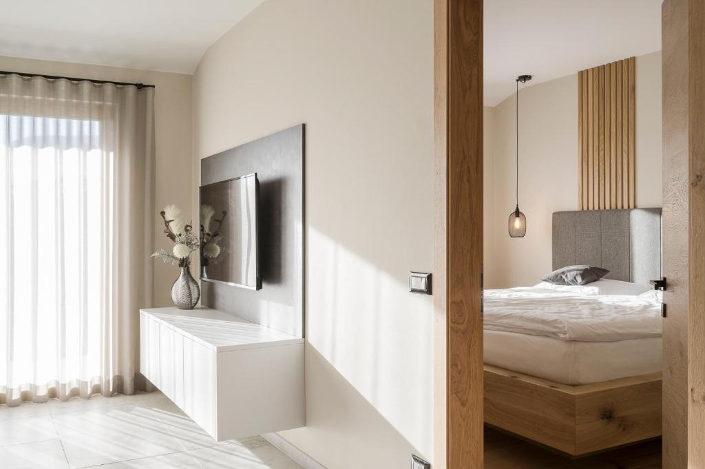 Postel nebo postele na pokoji v ubytování Boutique Hotel Wiesenhof - Adults Only