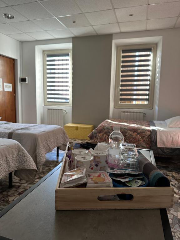 Postel nebo postele na pokoji v ubytování B&B Orchidea Bianca