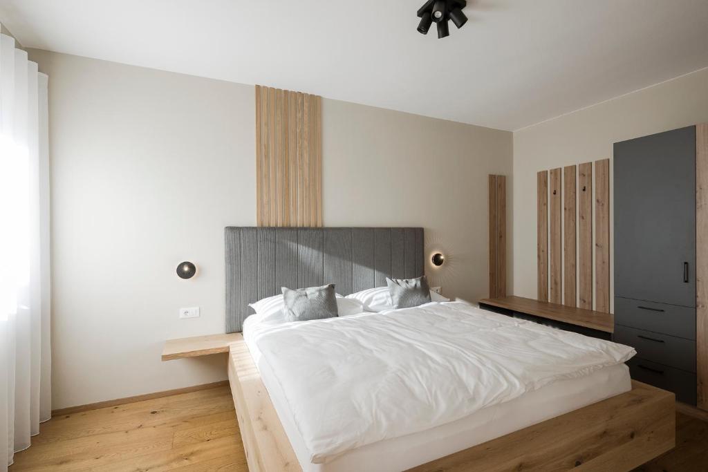 Postel nebo postele na pokoji v ubytování Boutique Hotel Wiesenhof - Adults Only