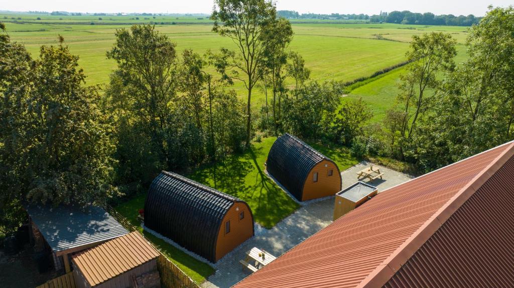 an overhead view of two domes on top of a house at Camping pod Lyts Dekema 1 in Baard