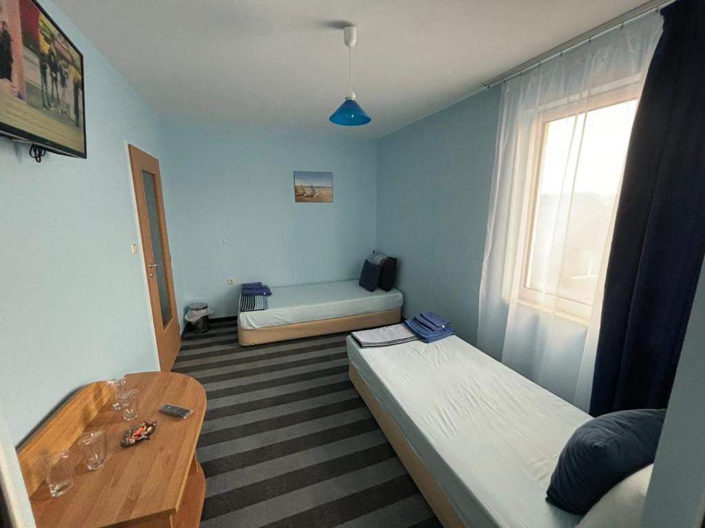 Postel nebo postele na pokoji v ubytování Мирели