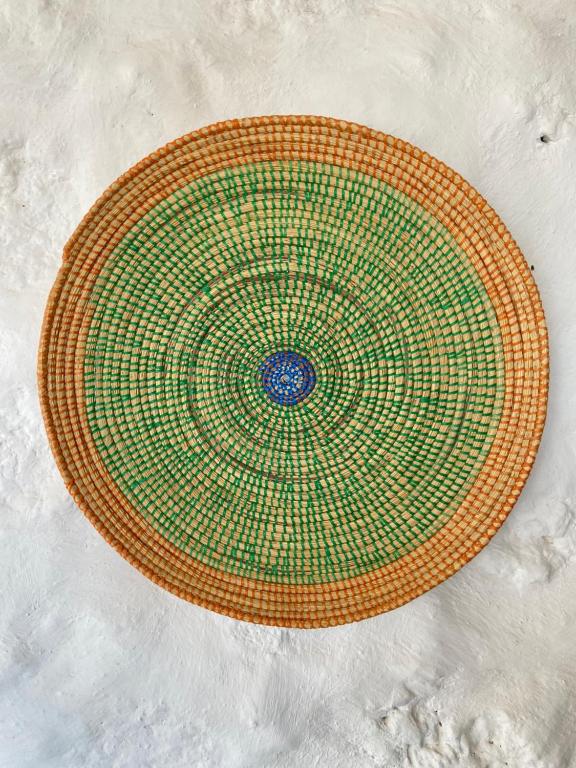 an overhead view of a large woven basket in the snow at Casa Kira, Macher in Mácher