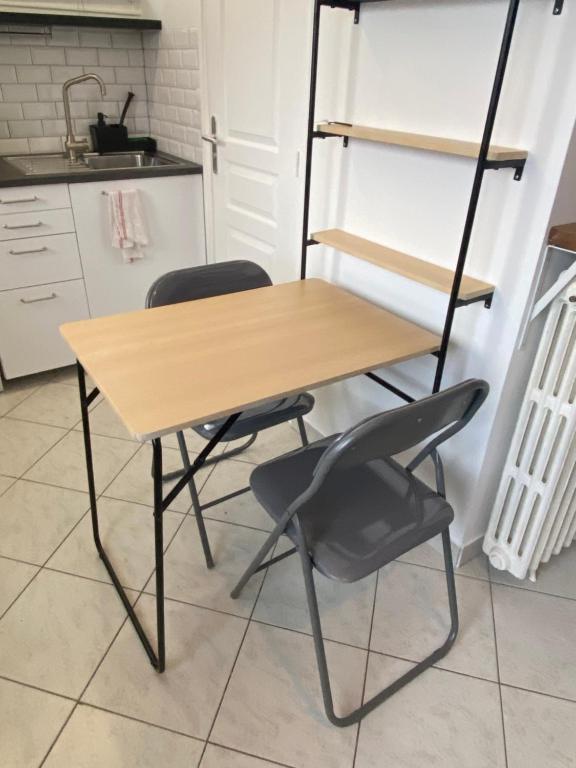 Kuchyňa alebo kuchynka v ubytovaní Hôtel Particulier