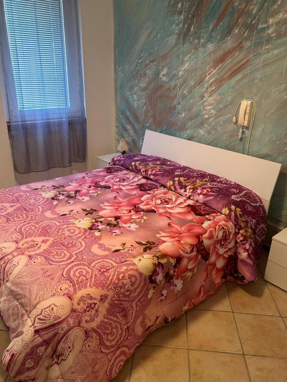 Postel nebo postele na pokoji v ubytování Albergo La Grolla