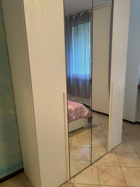 Postel nebo postele na pokoji v ubytování Albergo La Grolla