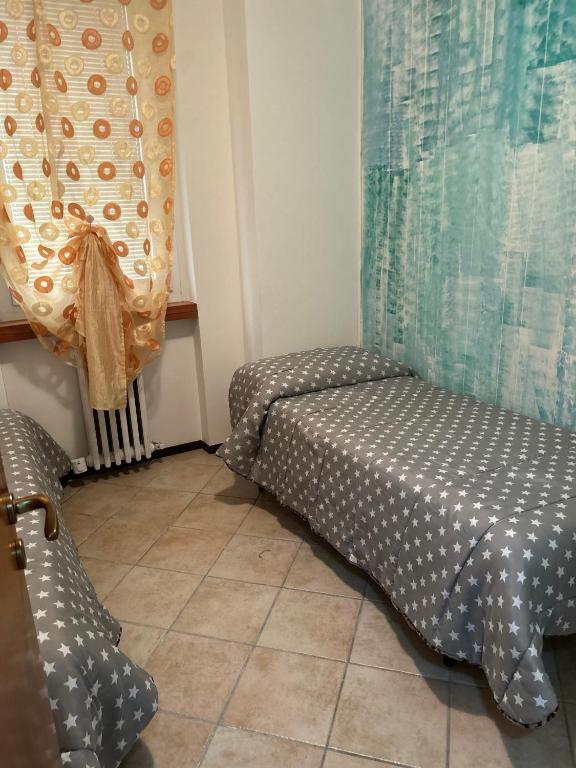 Postel nebo postele na pokoji v ubytování Albergo La Grolla