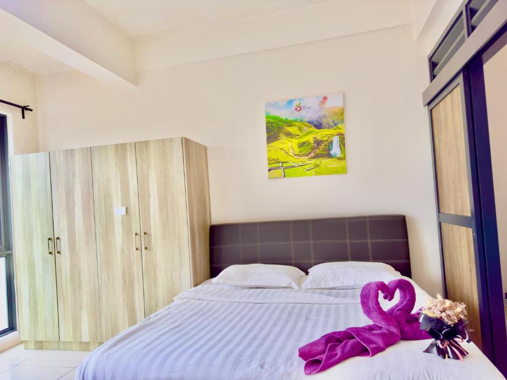 Postel nebo postele na pokoji v ubytování ATS Cameron Hotel & Apartments