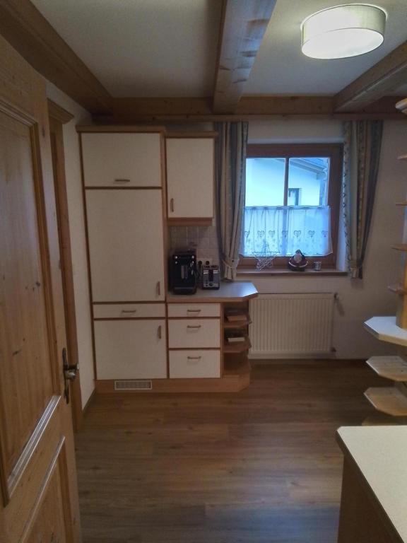 Kuchyň nebo kuchyňský kout v ubytování Comfort-Appartement Keiler